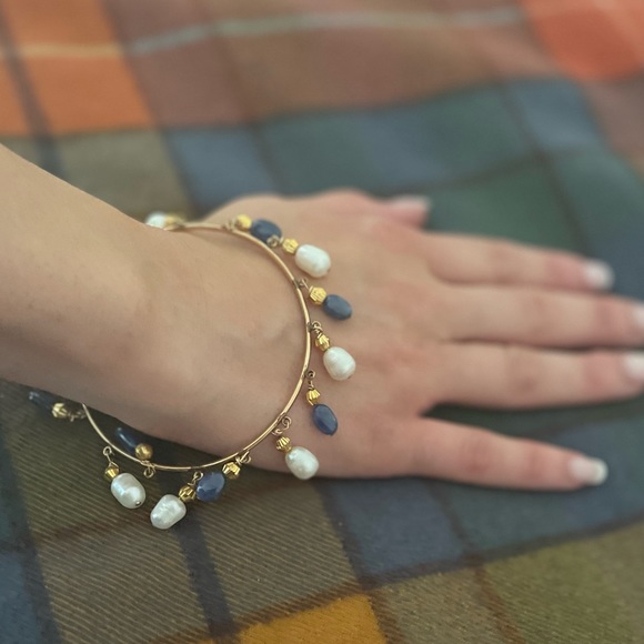 Gold plated bangle with white and blue mother of pearl. - Picture 3 of 4